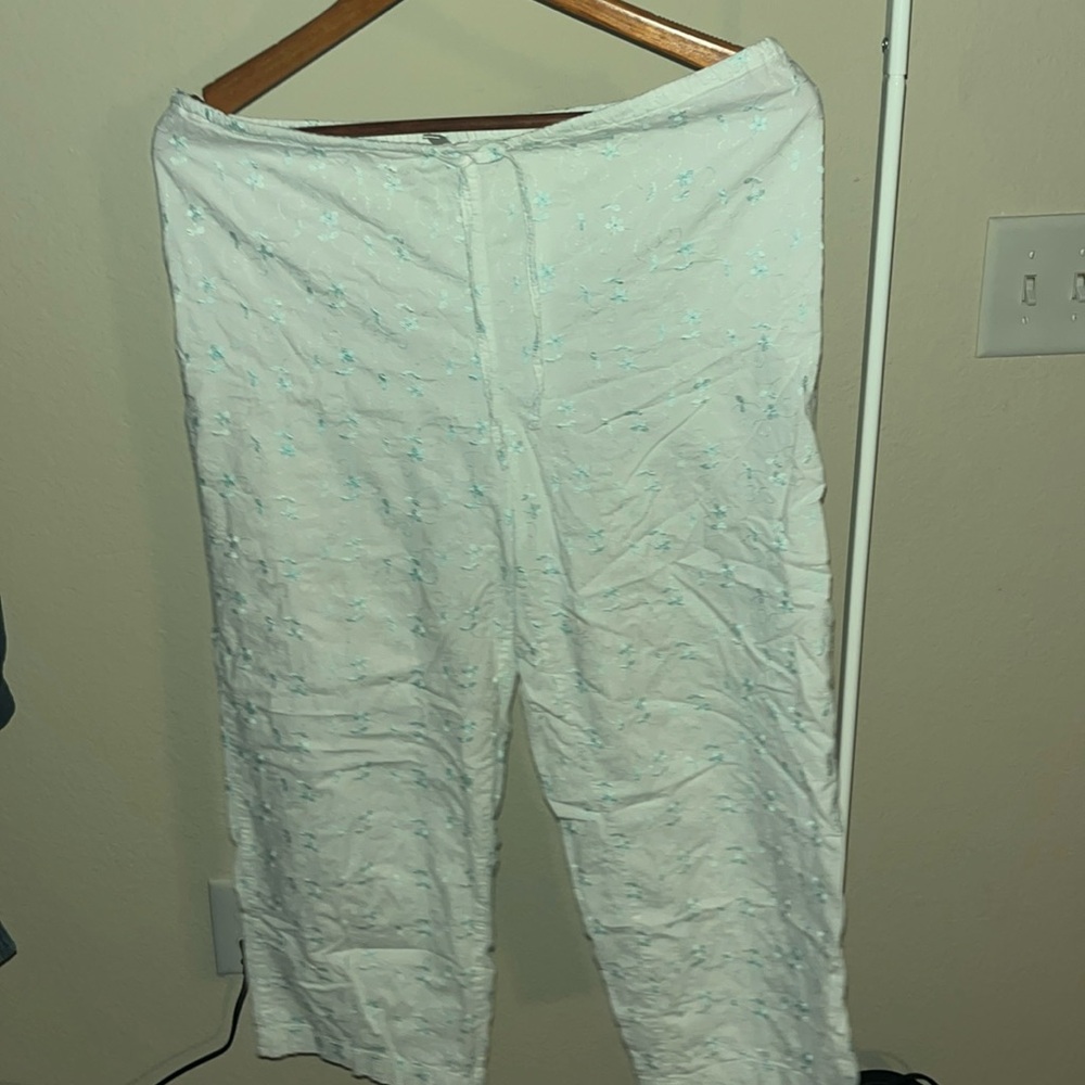 Adonna vintage white capris with baby blue floral design.